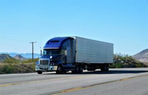 Blue big rig truck – heavy-duty vehicle used for long-distance freight transportation