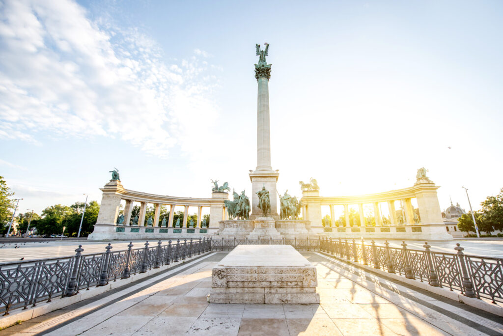 Morning view on the empty Heroes square with monument and column during the sunny weather in Budapest, Hungary