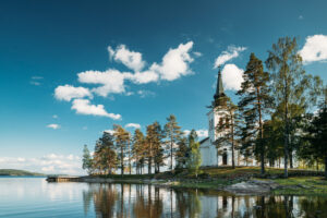 Tocksfors, Sweden. Stommen Church In Sunny Summer Day. Local Landmark.