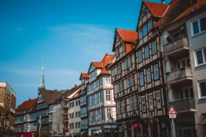 Traditional half-timbered German houses along a street, evoking destinations in a Germany relocation.