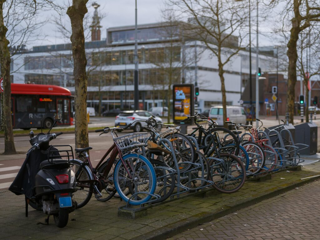 Bicycles parked along a Dutch street with urban background—representing sustainable lifestyle and what the Dutch are known for globally.