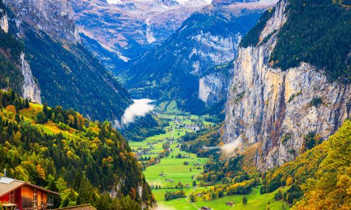 Lauterbrunnen, Switzerland valley from Wengen in the fall season with Staubbach Falls.